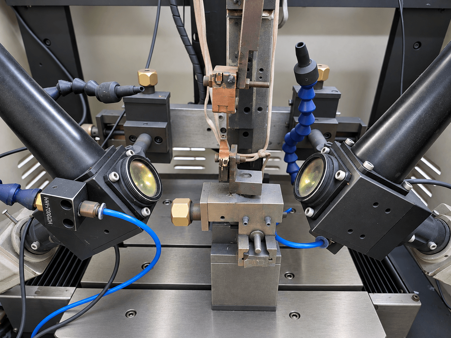 Metal frame components held in a joining fixture