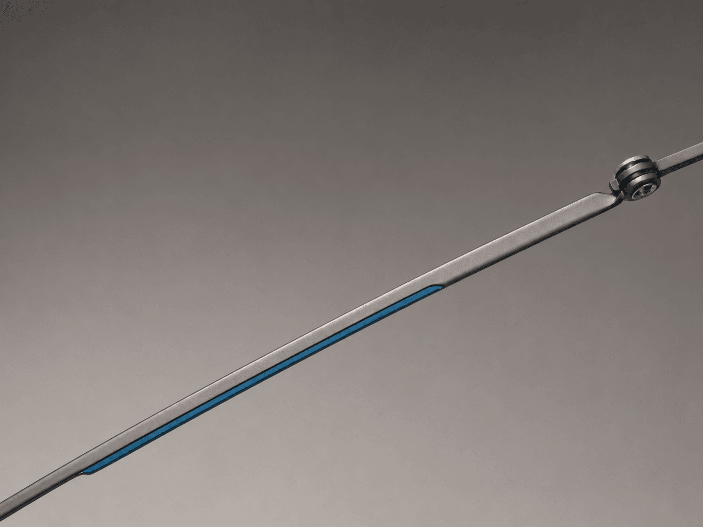 S-L7021 slim gunmetal-tone temple with a blue inset and circular hinge connection.